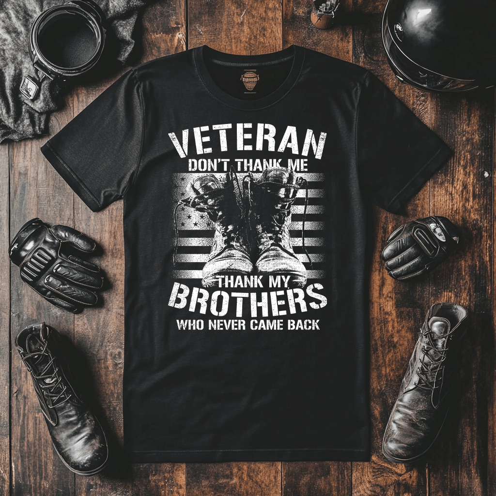 A veterans tshirt mock up showing a black tee with a United States flag and a pair of army boots.