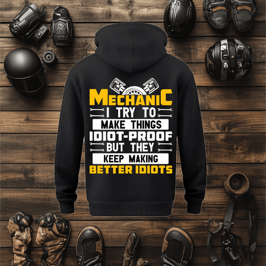 Mock up of a black mechanics hoodie. Surrounded in motorcycle apparel.